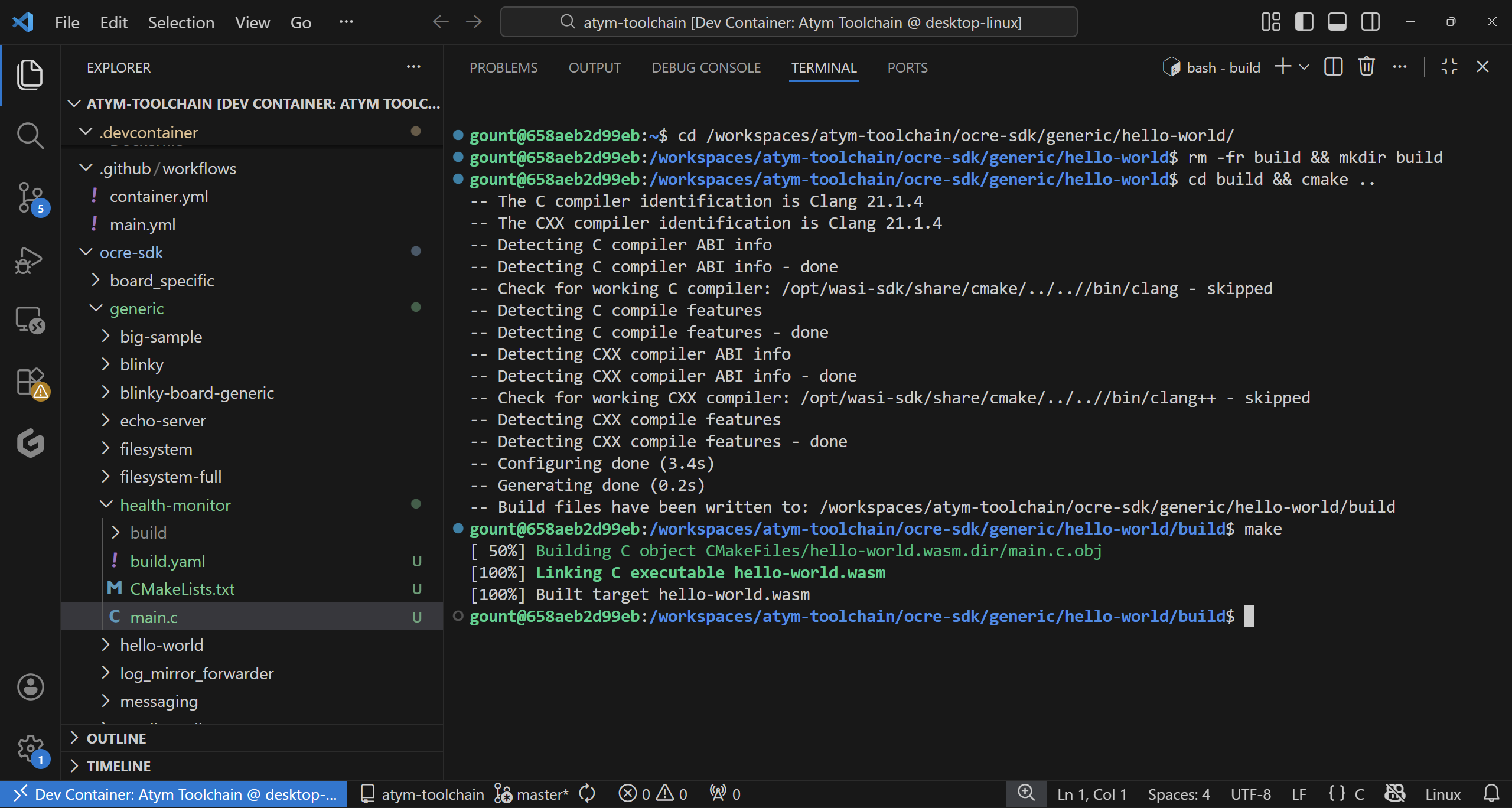 Terminal output showing cmake and make building hello-world.wasm